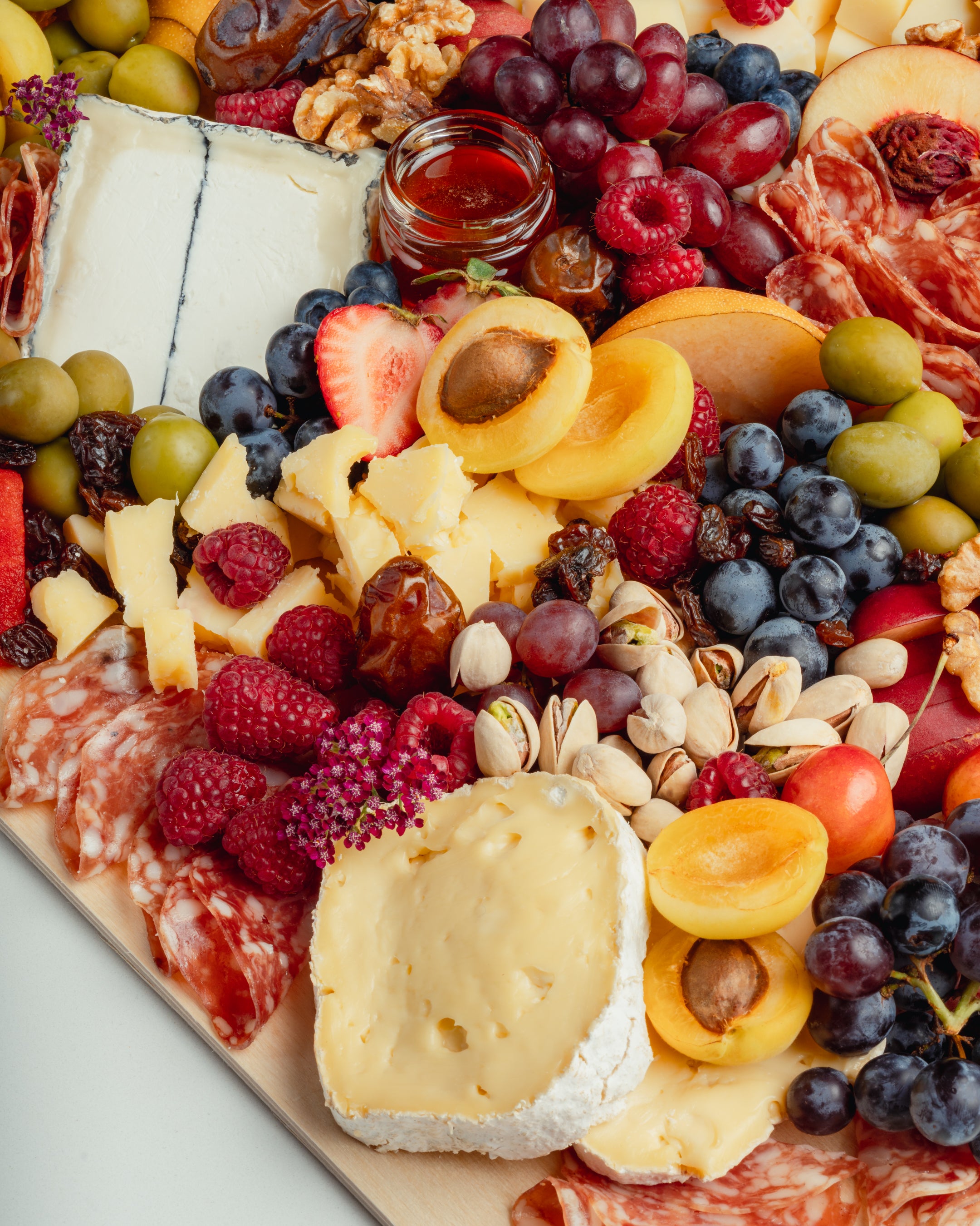 The Entertainer — Meat & Cheese Board (Serves 15–20)
